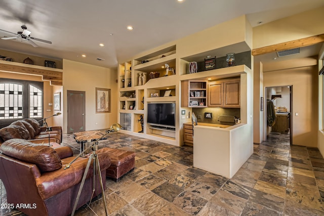 living room featuring ceiling fan