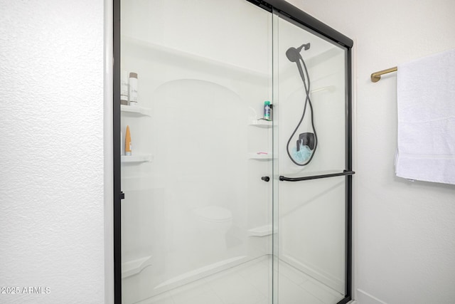 full bathroom featuring a stall shower