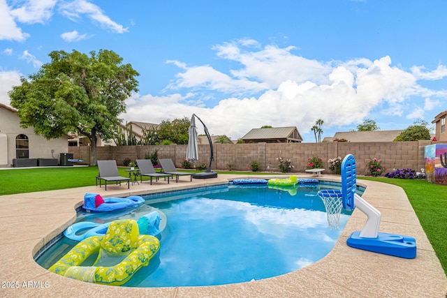 view of swimming pool featuring a patio area