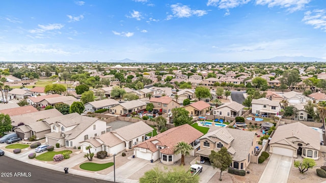 aerial perspective of suburban area with mountains