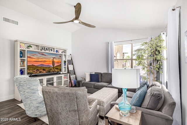 living area with lofted ceiling, a ceiling fan, wood finished floors, and baseboards