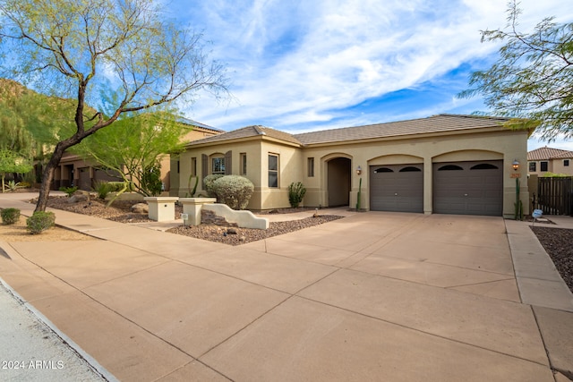 view of front of property with a garage