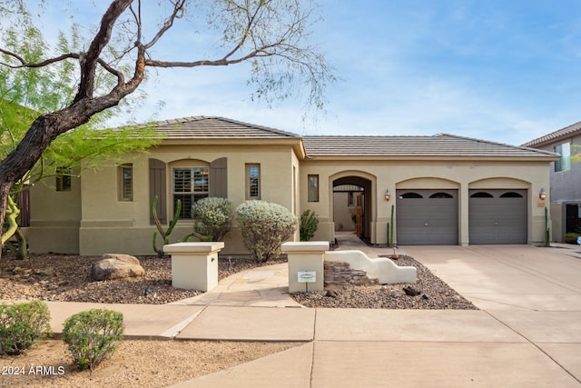 view of front of property featuring a garage