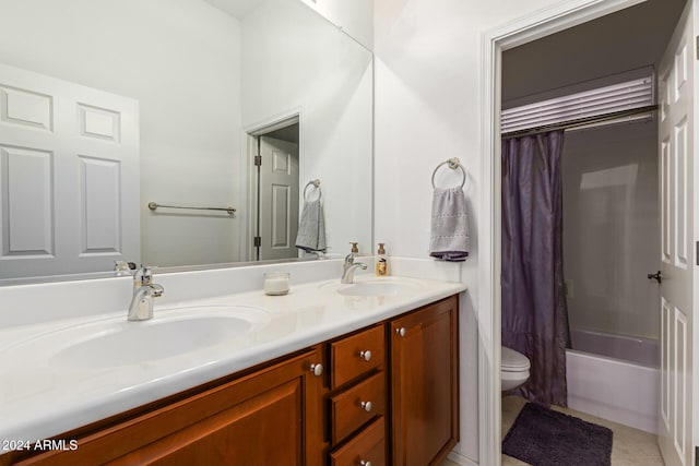 full bathroom featuring vanity, shower / bath combo, toilet, and tile patterned floors