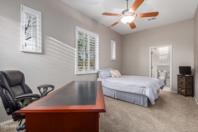 carpeted bedroom featuring ensuite bathroom and ceiling fan