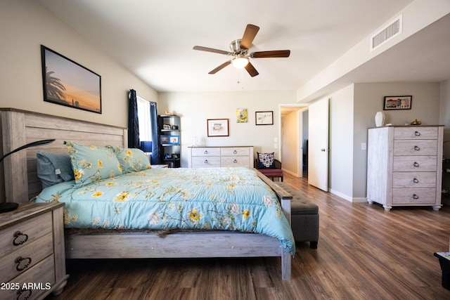 bedroom with dark wood-type flooring and ceiling fan