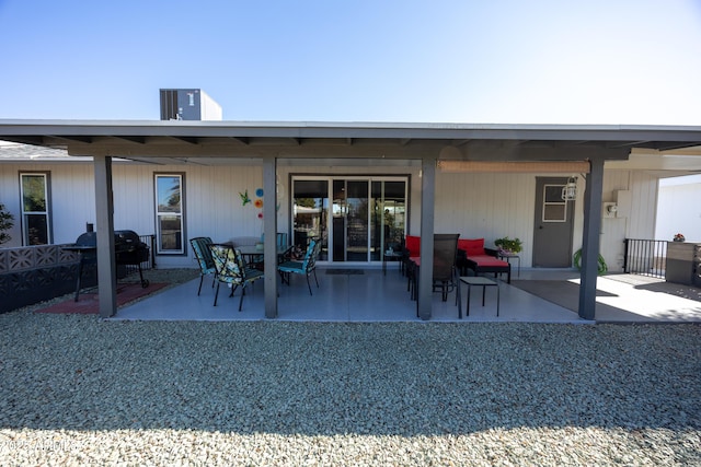 back of property featuring a patio area