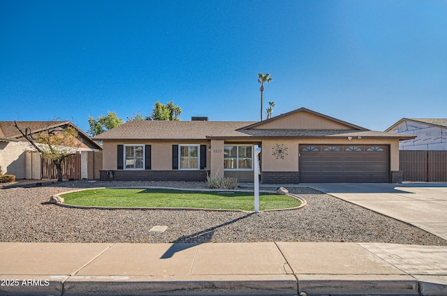 ranch-style home featuring a garage