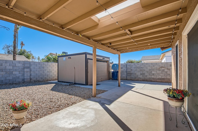 view of patio / terrace featuring a storage unit