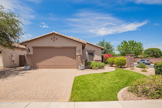 1410 W Popcorn Tree Ave, Queen Creek, AZ 85140 - view of front of property with decorative driveway, a garage, stucco siding, and a front yard