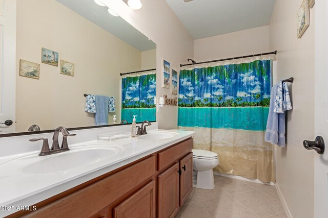 1410 W Popcorn Tree Ave, Queen Creek, AZ 85140 - bathroom featuring tile patterned floors, toilet, double vanity, and curtained shower