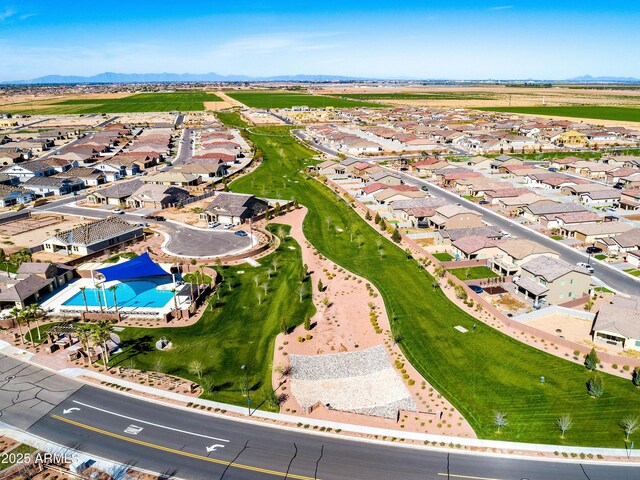 1410 W Popcorn Tree Ave, Queen Creek, AZ 85140 - aerial perspective of suburban area featuring a mountainous background and a pool area