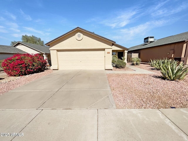 2906 W Irma Ln, Phoenix, AZ 85027 - ranch-style house featuring concrete driveway, an attached garage, stucco siding, and cooling unit