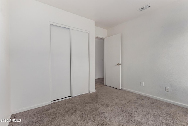 2906 W Irma Ln, Phoenix, AZ 85027 - unfurnished bedroom with carpet, a closet, and baseboards