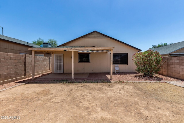 2906 W Irma Ln, Phoenix, AZ 85027 - back of house featuring a patio and a fenced backyard