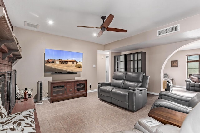 living room featuring ceiling fan