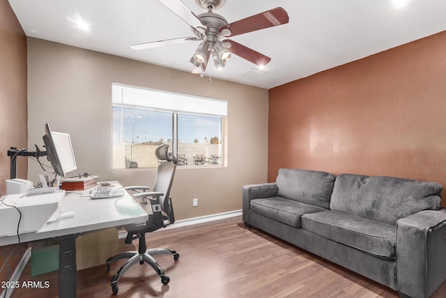 office space with ceiling fan and hardwood / wood-style floors