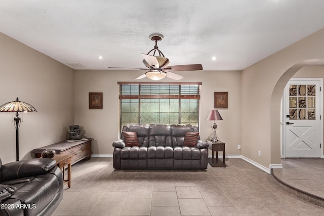 living room with ceiling fan