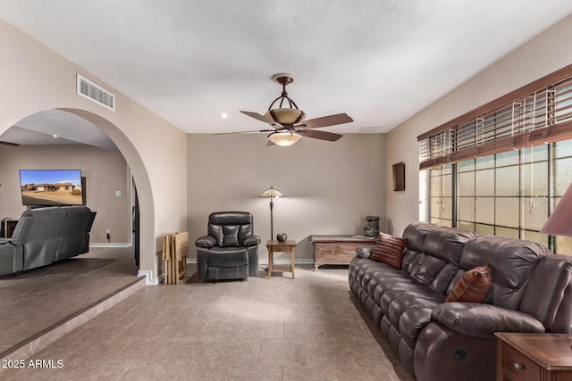 living room featuring ceiling fan