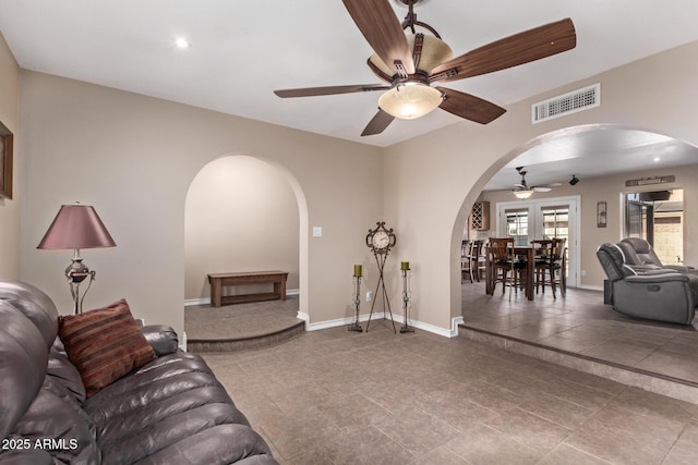 living room with ceiling fan