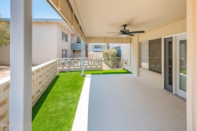 view of patio with ceiling fan