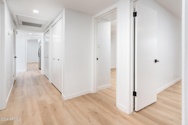 hall featuring light hardwood / wood-style flooring