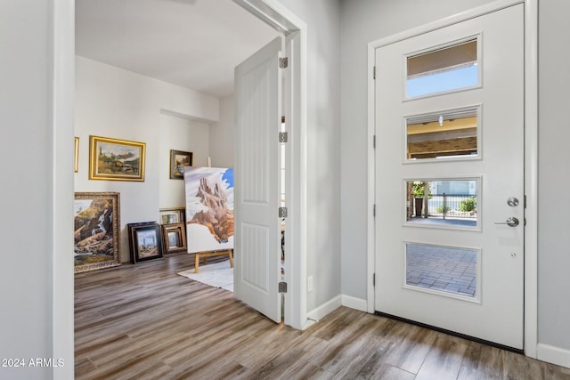 foyer with light wood-type flooring