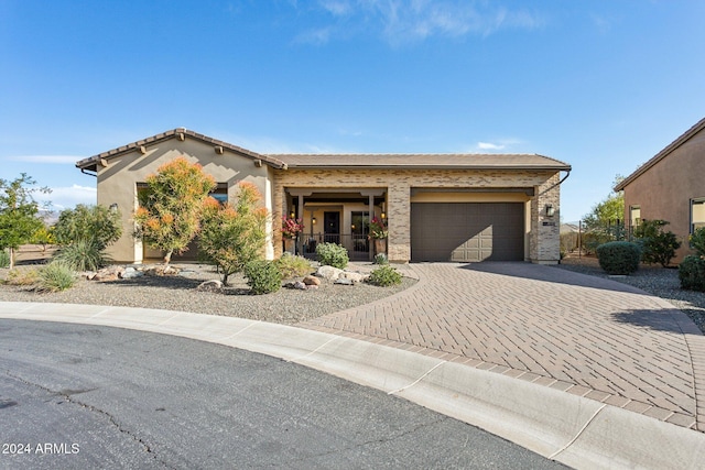 view of front of home with a garage