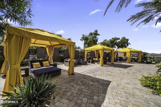 view of patio with a gazebo and an outdoor hangout area