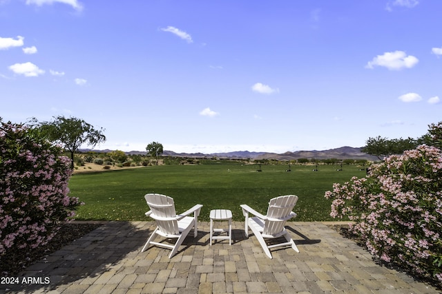 view of patio with a mountain view