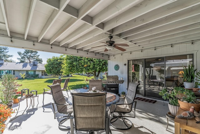 view of patio / terrace with ceiling fan and area for grilling