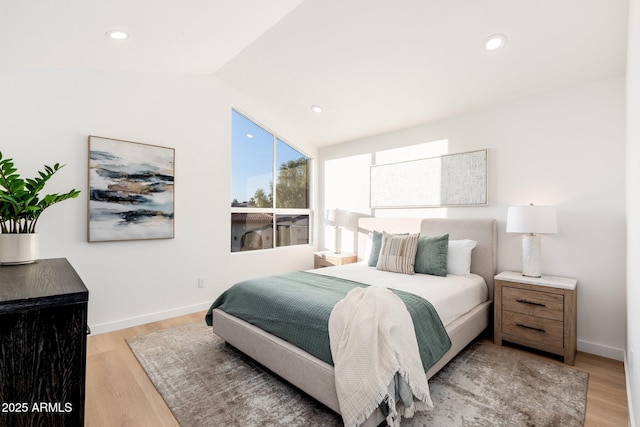 7223 N 14th St, Phoenix, AZ 85020 - bedroom with light wood finished floors, recessed lighting, vaulted ceiling, and baseboards