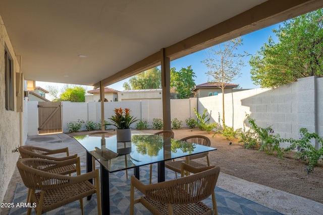 7223 N 14th St, Phoenix, AZ 85020 - fenced backyard featuring outdoor dining space, a patio, and a gate