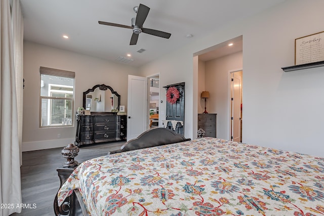 bedroom featuring dark wood-type flooring and ceiling fan