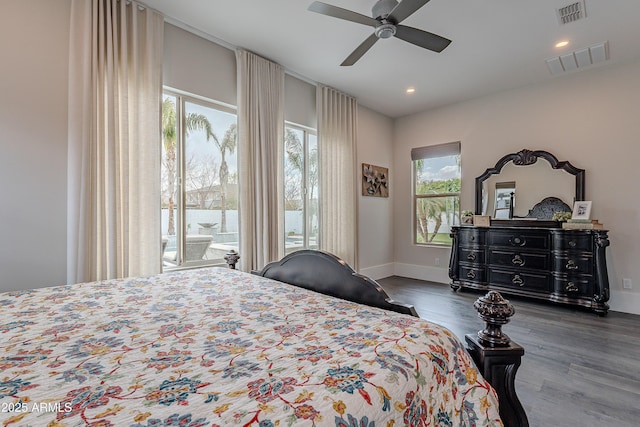 bedroom with ceiling fan, access to outside, and dark hardwood / wood-style flooring