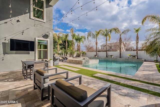 view of swimming pool featuring a patio area