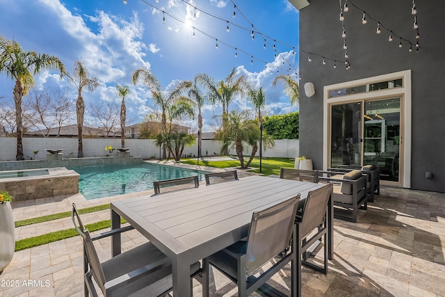 view of swimming pool featuring an in ground hot tub and a patio area