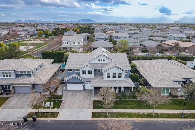 drone / aerial view featuring a mountain view