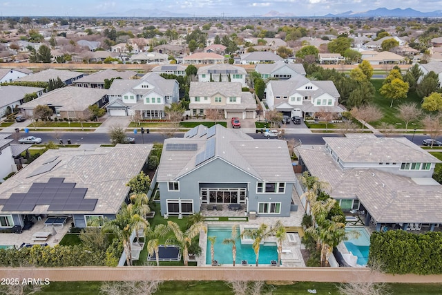 birds eye view of property featuring a mountain view