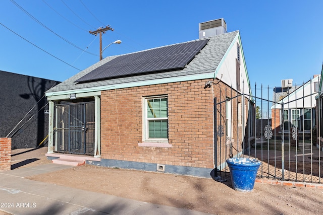 exterior space with solar panels