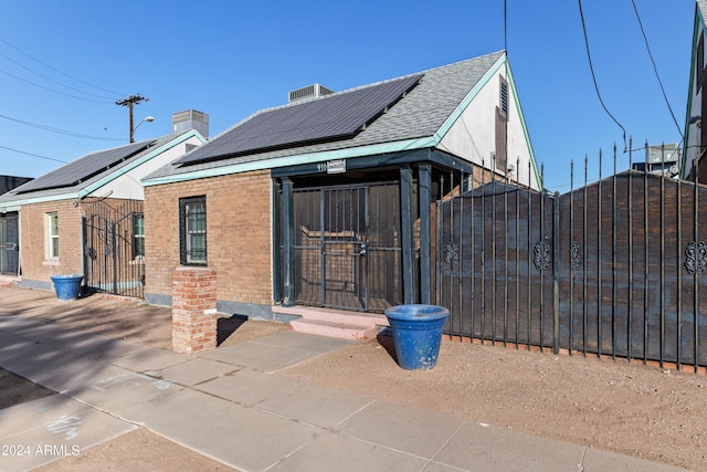 exterior space with solar panels