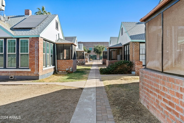 view of yard featuring a sunroom