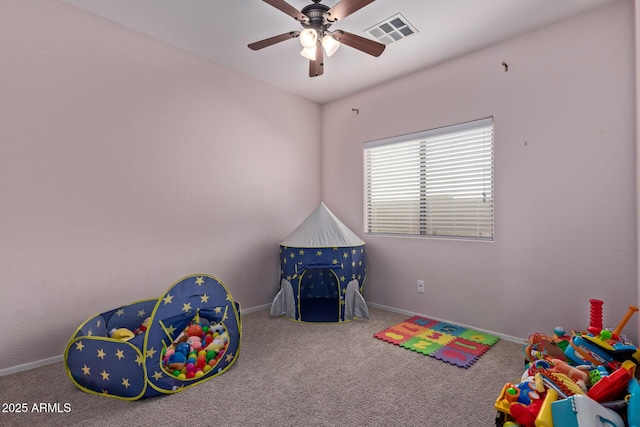 playroom featuring carpet floors and ceiling fan