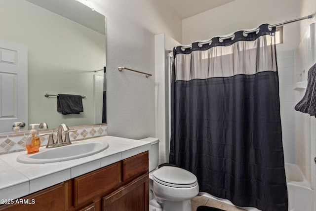 full bathroom with tile patterned floors, vanity, toilet, and shower / tub combo with curtain