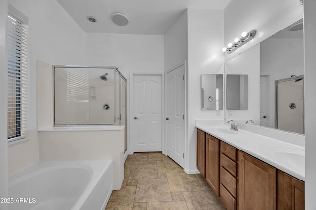 bathroom with vanity and plus walk in shower