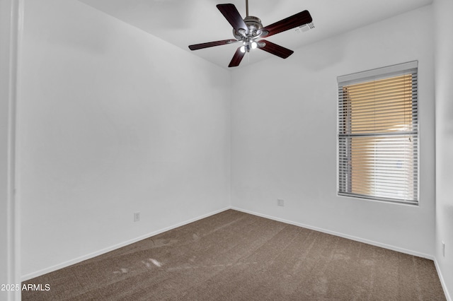 empty room with carpet floors and ceiling fan