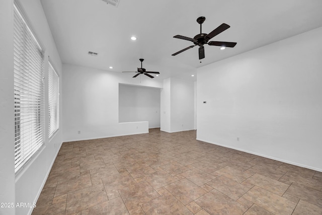 spare room featuring ceiling fan