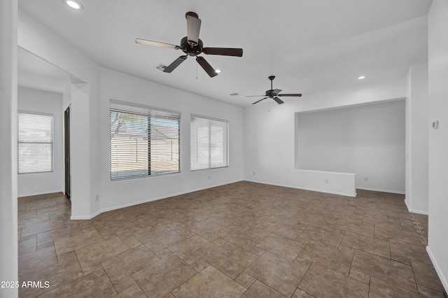 empty room featuring ceiling fan