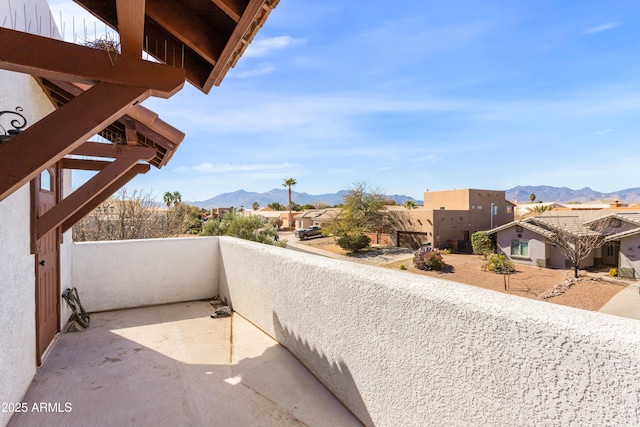 balcony featuring a mountain view