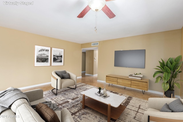 living room with ceiling fan